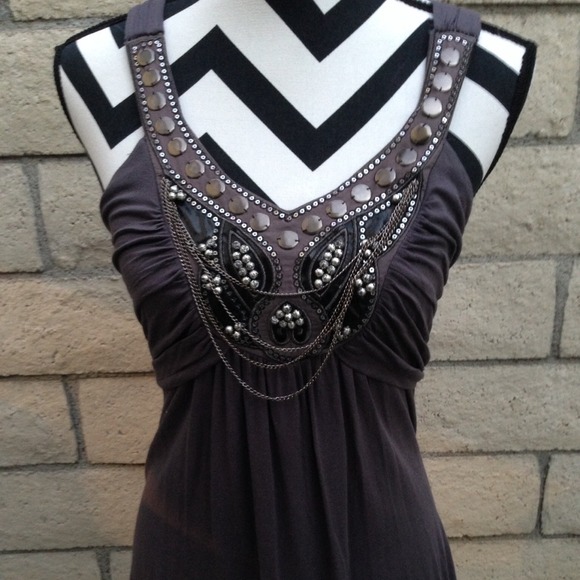 Grey top with embellishments & ruching.
