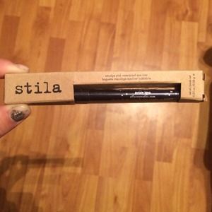 stila eyeliner pen. Purple tang