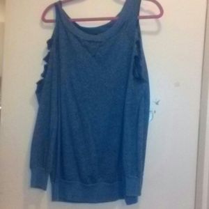 Blue sweater with side cuts