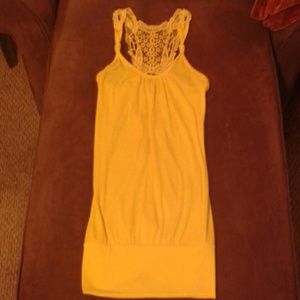 Bright yellow sleeveless back cut out top