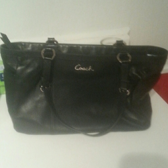 Coach Black Purse with two pockets on side