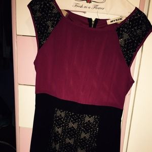 Dress red with black and a tan color inside