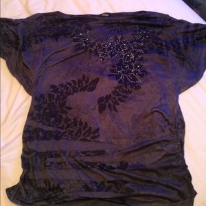 Cute black top with adorable detail