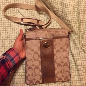 Coach Swingpack in signature fabric