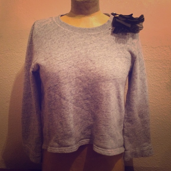 Grey sweater shoulder broach