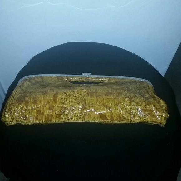 New Gold colored clutch with snap closure