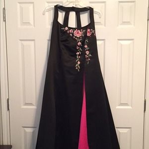 Elegant black dress with embroidered rose detail