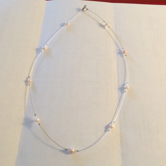 Decorative Necklace with white pearls