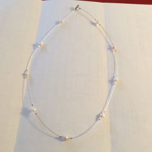 Decorative Necklace with white pearls