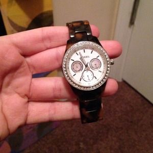 Brown and black fossil watch