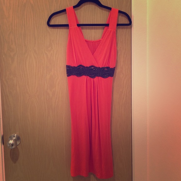 Orange belted summer dress.