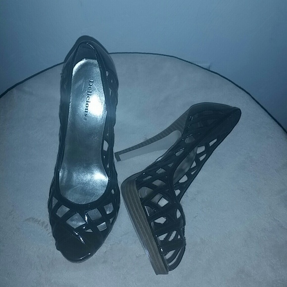 Black patent leather peep toe stilettos