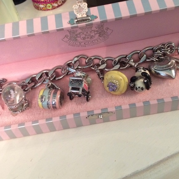 Silver juicy charm bracelet and five charms *sold*