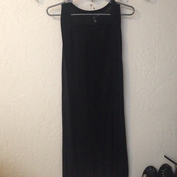 Sleeveless long black vest