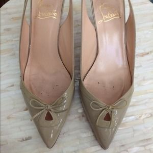 Nude Christian Louboutin heels