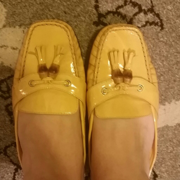 Yellow Talbots slip on loafers