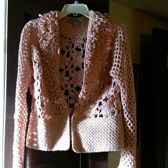 Pink crocheted cover up jacket.