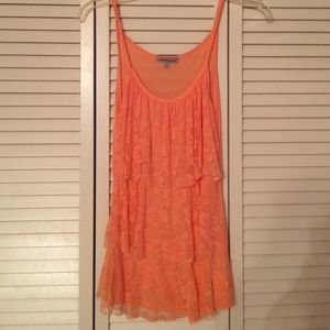 A peach colored Charlotte Russe shirt