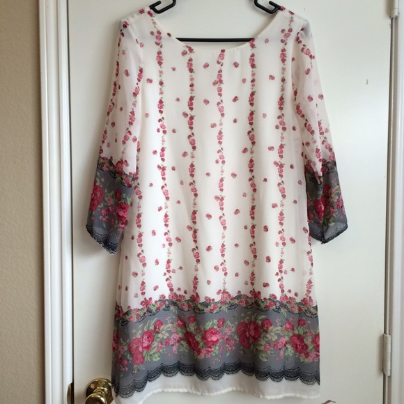 Small floral dress with cream background