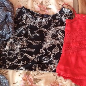A crop top ( kinda long in front & short back )