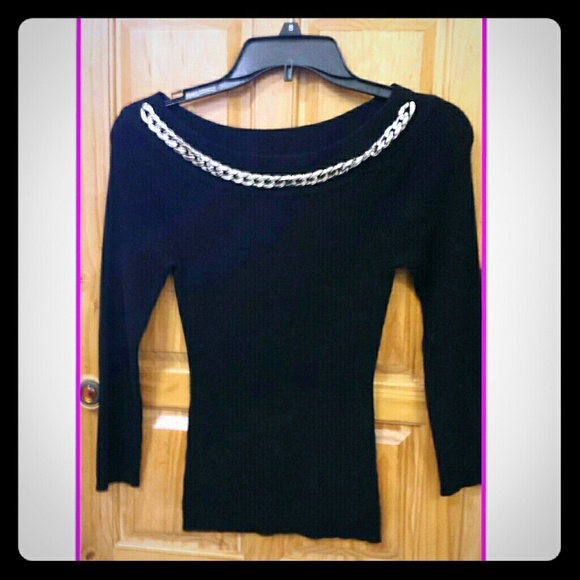Belldini black sweater with silver chain accent.