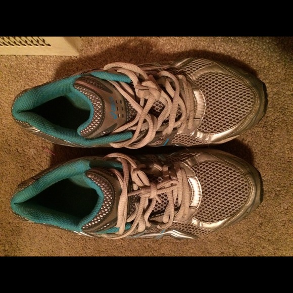 Silver and blue Asics