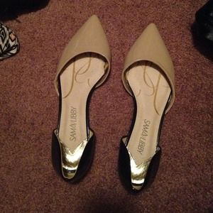 Black and beige flats