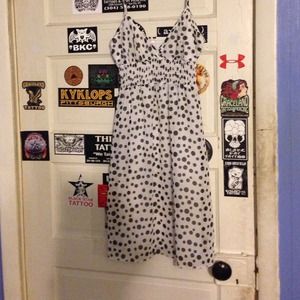 Tempted white, with black polka dots dress.