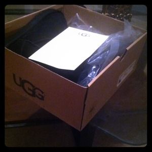 Brand new with box and tags pair of black uggs