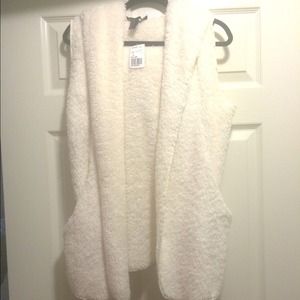 Fur vest and layered pink top