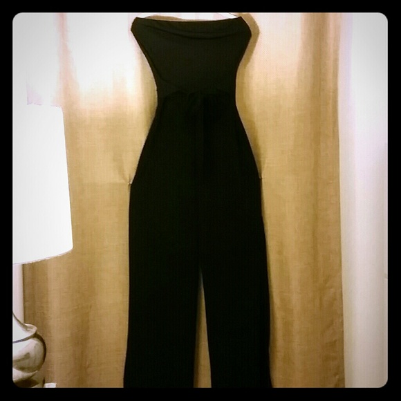 Sleeveless black one piece garment