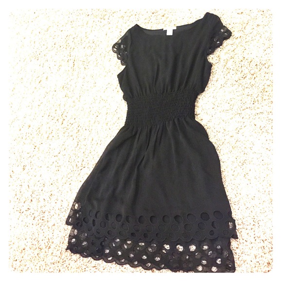 Little black dress with scalloped edges