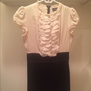 Little black dress with Ivory  ruffle details!