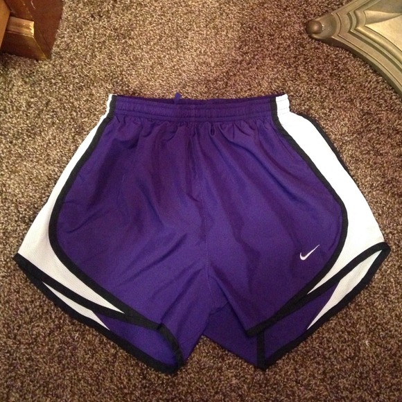 Purple Nike dri-fit shorts.
