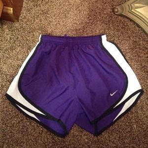Purple Nike dri-fit shorts.
