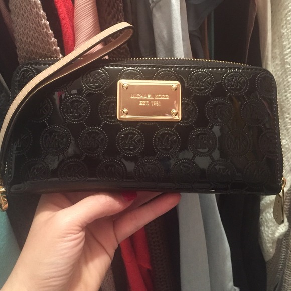 Sold! -Authentic MK continental wallet with strap