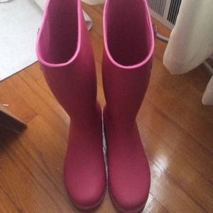 Pink rain boots