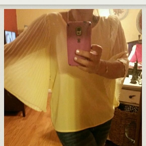Sunny yellow silky blouse.