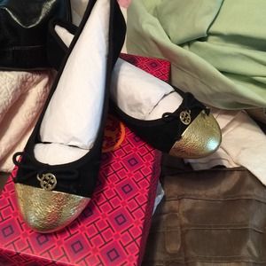 Black and gold ballet shoes