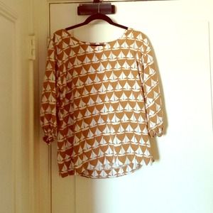 sail away in this adorable puffy sleeved shirt !