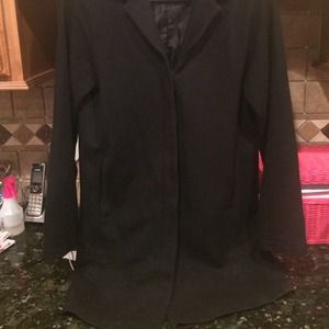 Ladies black wool mid length coat.