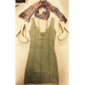 BEBE slightly distressed army green dress