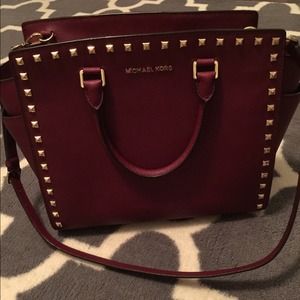 Michael Kors Maroon purse with gold studs
