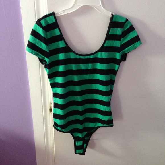 green and black body suit