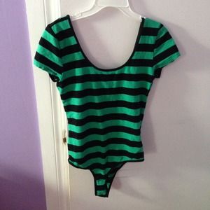 green and black body suit