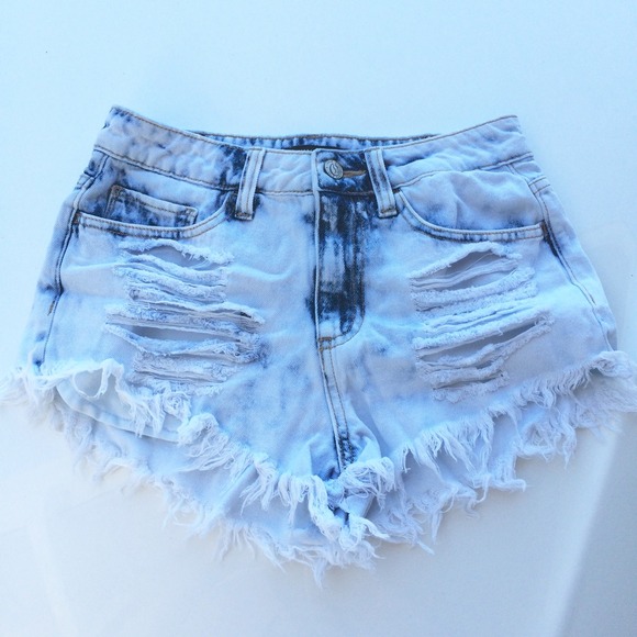Light wash distressed denim cut offs