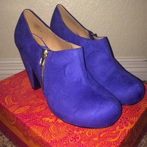 Blue suede booties with gold zipper