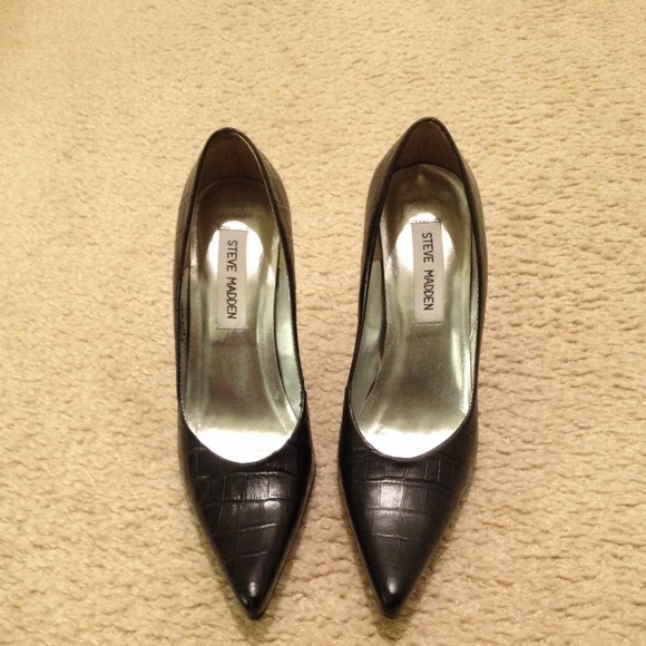 Black Steve Madden high heels.