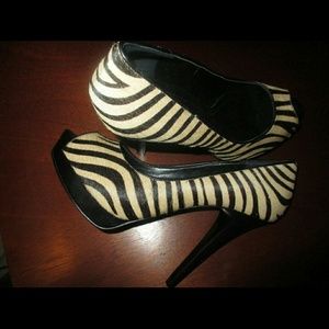 Animal print peep toe pumps