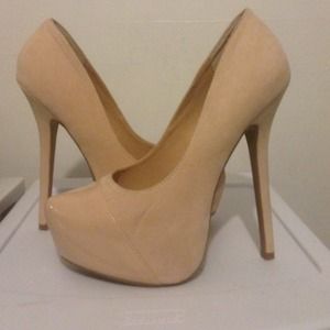 Nude cap toe pumps